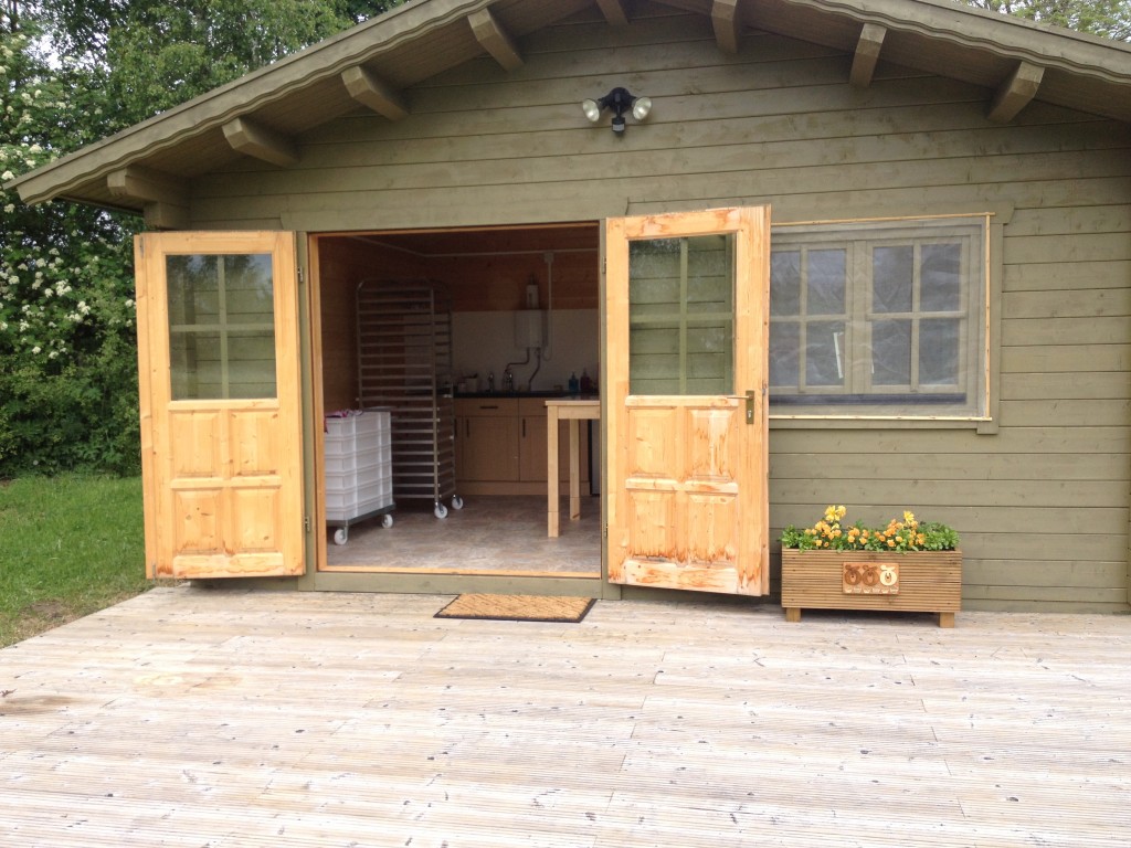 Outside of the cabin, screens fitted to the window and all equiped out with bakery racks and trays.
