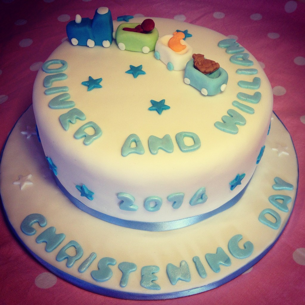 Rich fruit cake, decoarted for a double christening.